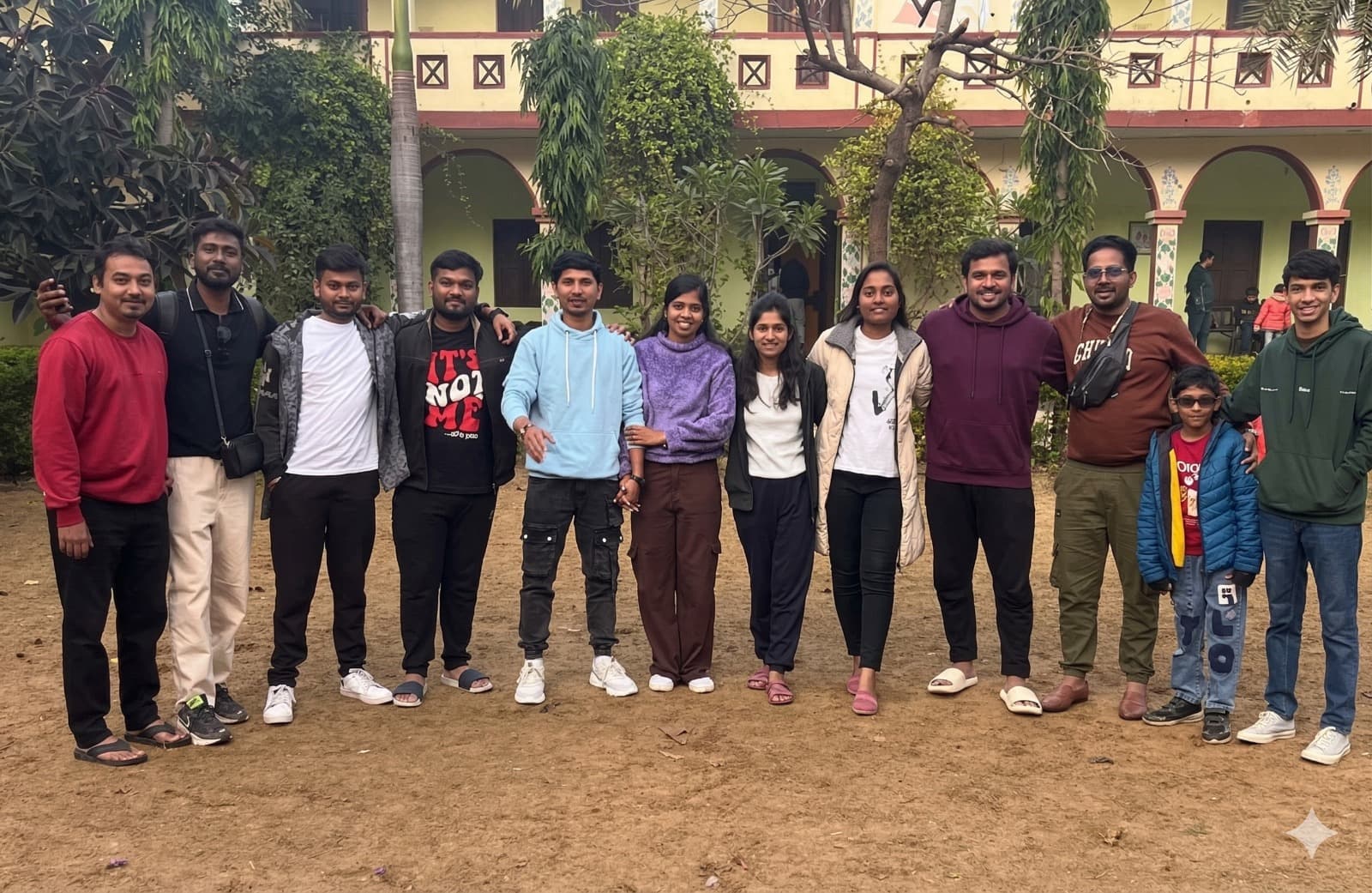 Group of friends enjoying beach sunset
